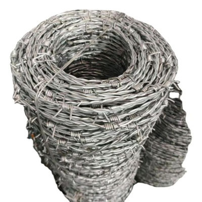 1.6mm 500m 25kgs / Roll Spiral Razor Wire Concertina Coil Wire Untuk Perlindungan